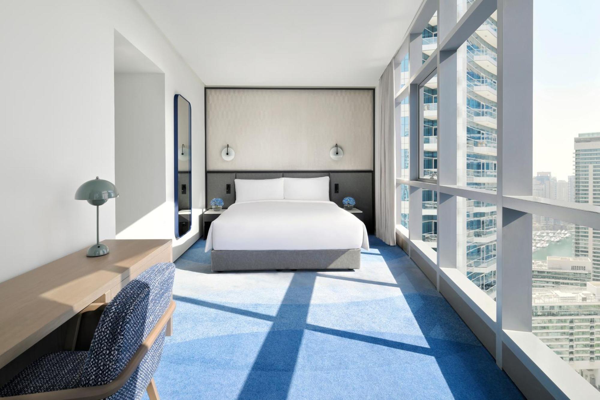 Intercontinental Dubai Marina By Ihg Hotel Kültér fotó A bedroom at the Address Downtown